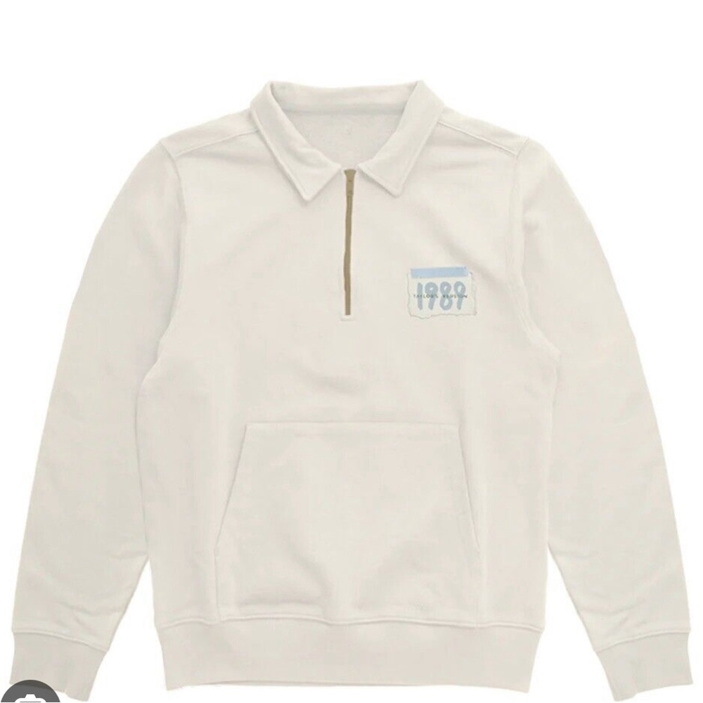 We found wonderland zip sweater